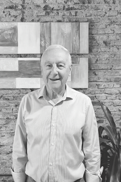 elegant elderly businessman 1950s style suit professional portrait founder real estate